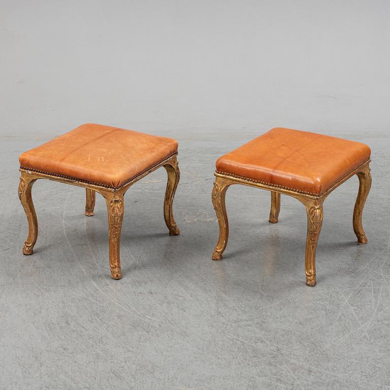 A pair of giltwood Louis XV 18th century stools.