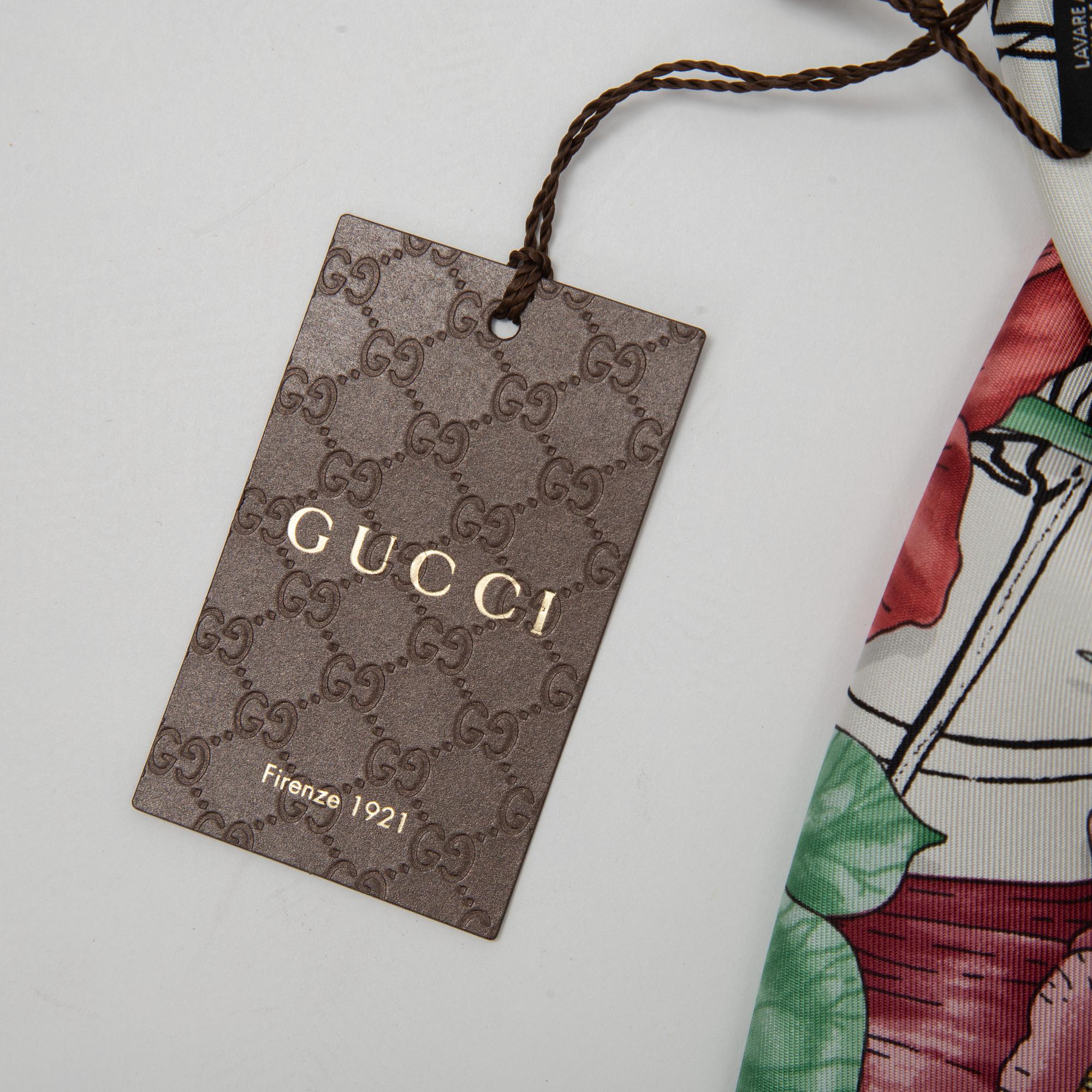 Gucci, a twill silk scarf.