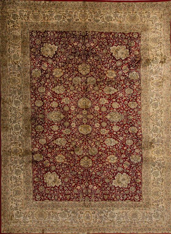 A Kashmir silk carpet ca 310 x 216 cm.