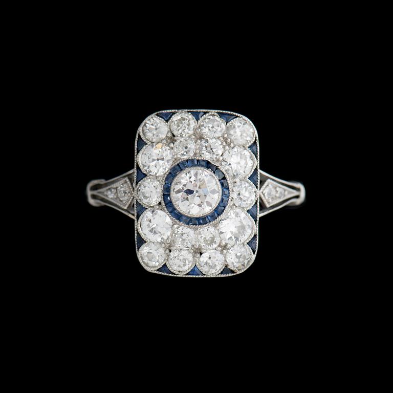 A RING, old cut diamonds, square cut sapphires, platinum, gold. Art deco.