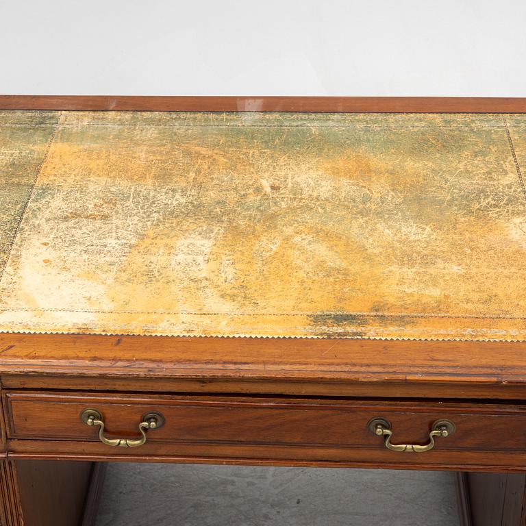 A 20th century writing desk, England.