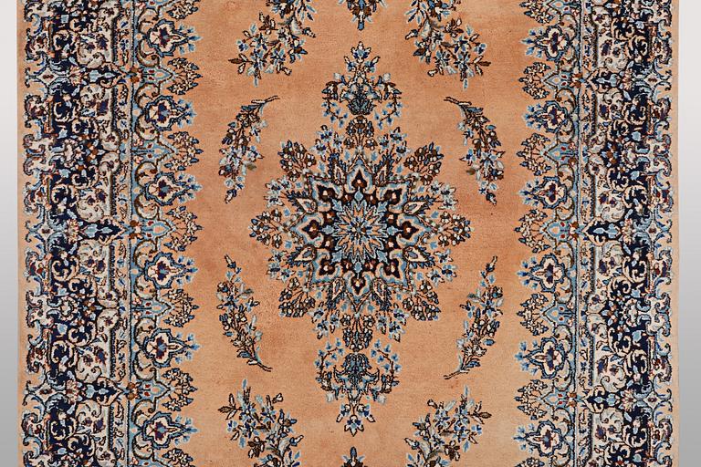 A carpet, Kerman, ca 352 x 188 cm.