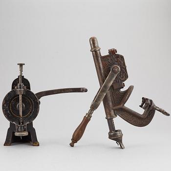 Two wine bottle openers, one Eskilstuna, circa 1900.