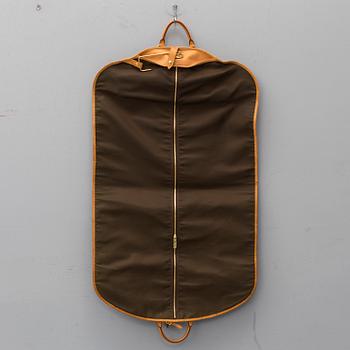 LOUIS VUITTON, a 'Housse Porte-Habits' garment bag.