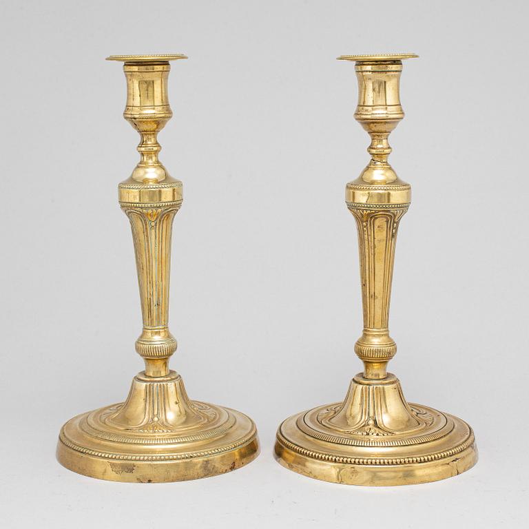 A pair of late 18th century candlesticks.