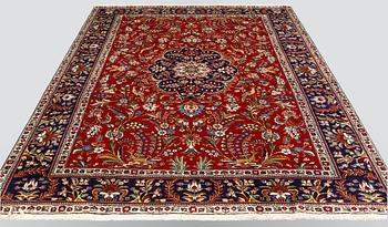 A carpet, Figural Tabriz, ca 310 x 220 cm.