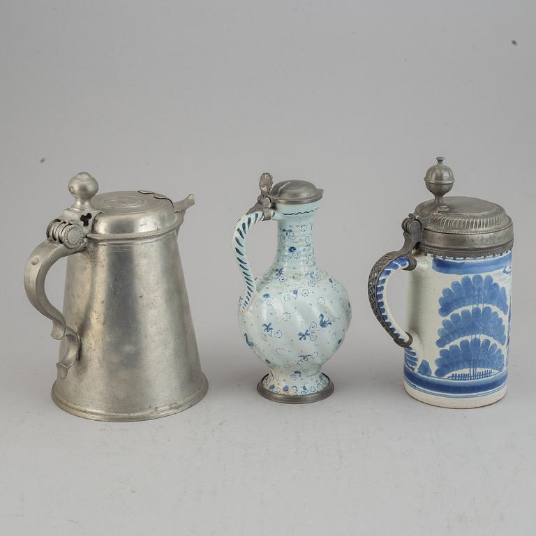 A group of three pewter and faience ewers, Holland/Germany, 18th/19th Century.