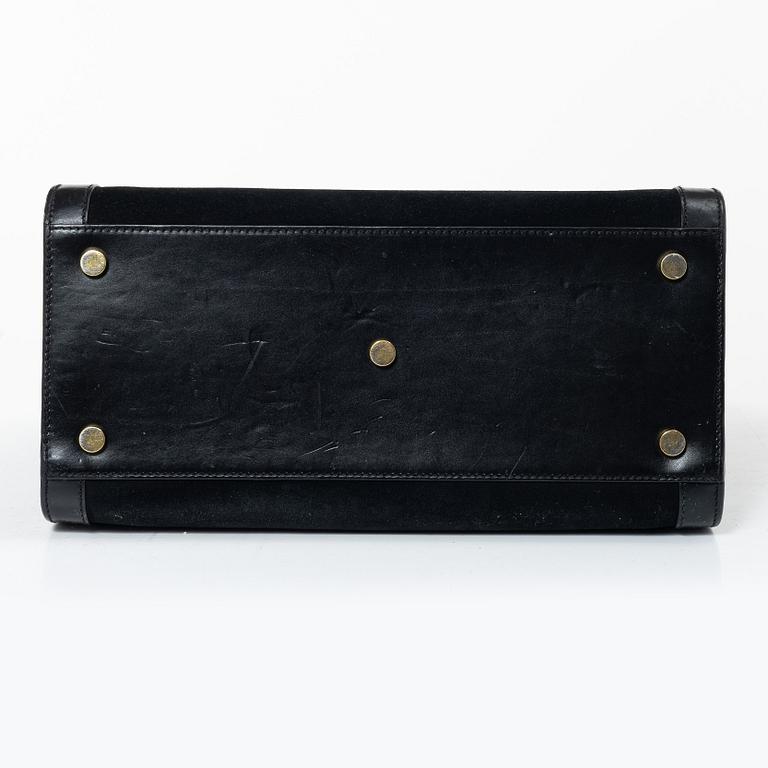 Yves Saint Laurent, a 'Sac du Jour' handbag.