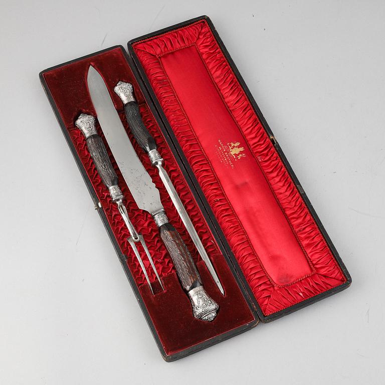 An English 19th century three piece set of serving cutlery.