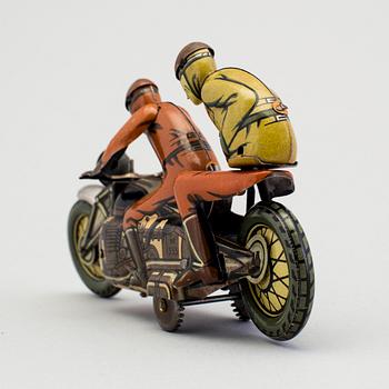 A tinplate Kellerman military motorcycle 353, Germany c. 1950.