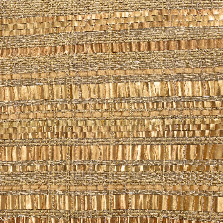 Chanel, a gold bouclé jacket, size 34.