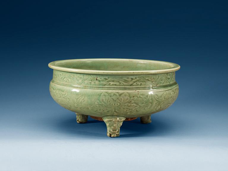 A large celadon tripod censer, Ming dynasty (1368-1644).