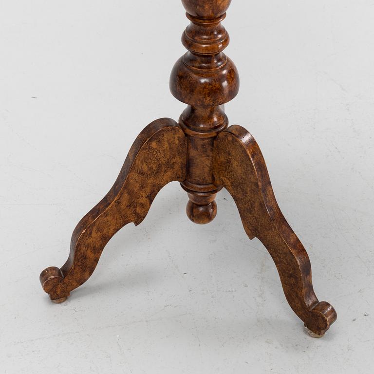 A birch side table, 20th Century.