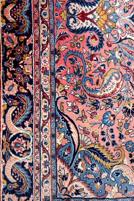 An oriental semiantique carpet ca 313x260 cm.