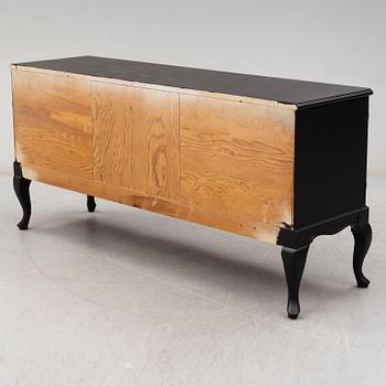 A second half of the 20th Century rococo style painted sideboard.