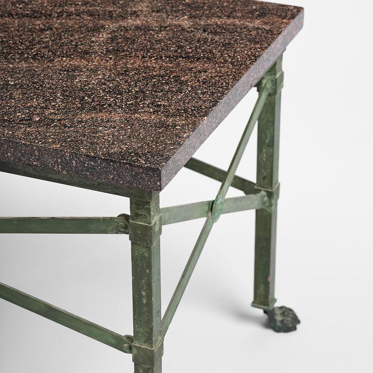 A table with Swedish 'Orrlok' porhyry top, early 19th century on a later bronze stand.