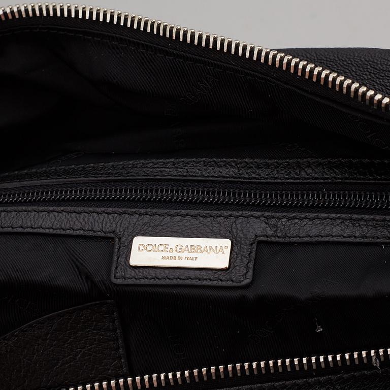 DOLCE & GABBANA, a black leather weekend bag, 2009.