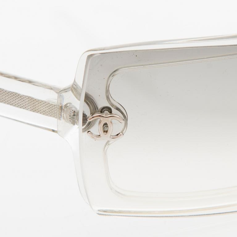 A Pair of Model 5067 Sunglasses.