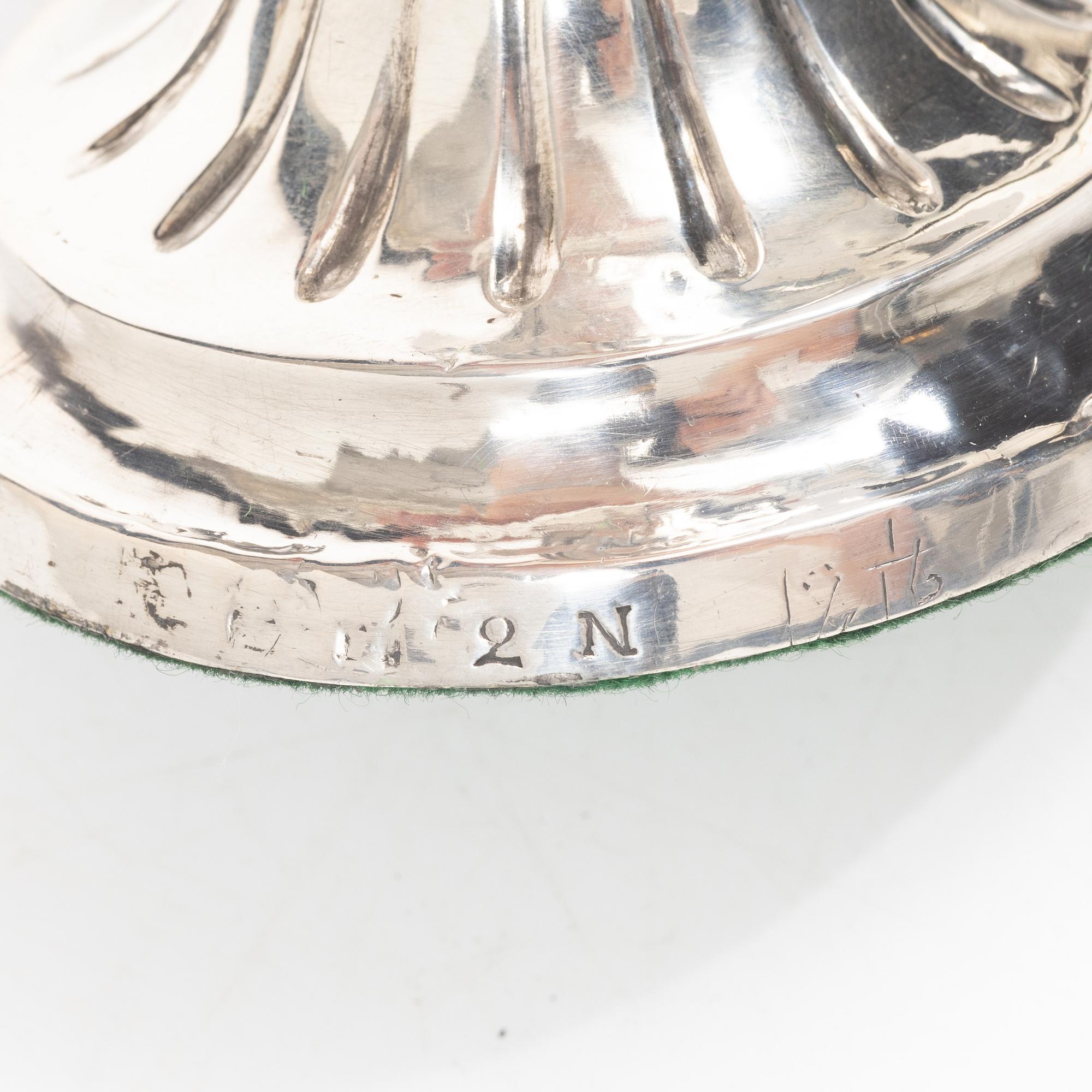 A Swedish pair of 18th century Gustavian silver candlesticks, worn city and maker’s marks, Sweden 1795.