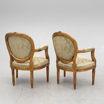 A pair of Gustavian style armchairs, 19th century.