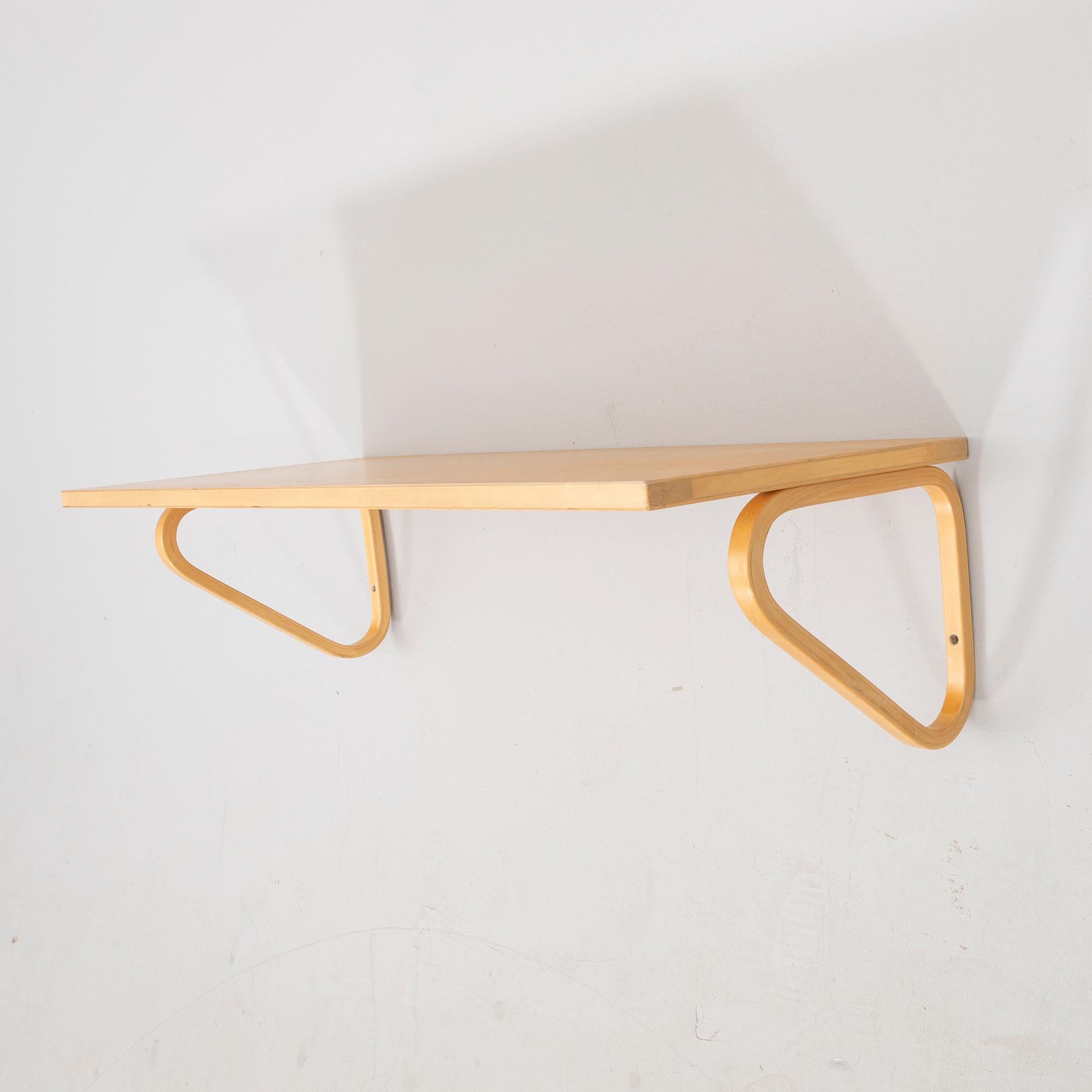 Alvar Aalto, a birch wall shelf, 112b Artek end of the 20th century.