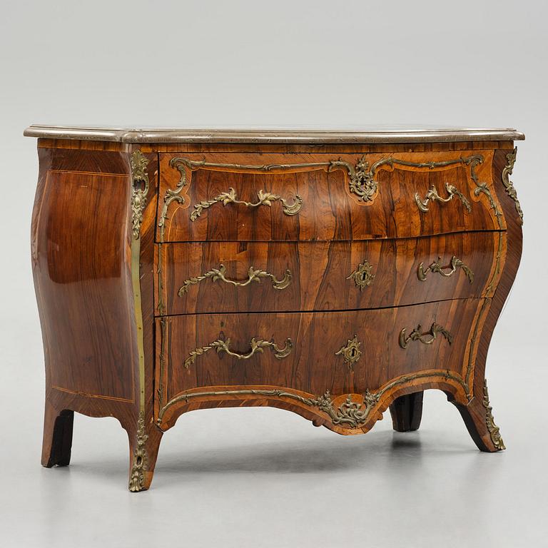 A rococo parquetry commode by C. G. Willkom (master in Stockholm 1763-65).