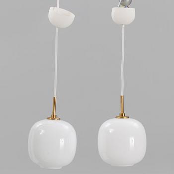 Vilhelm Lauritzen, a pair of  'VL45 Radiohus Pendants', Louis Poulsen, Denmark.