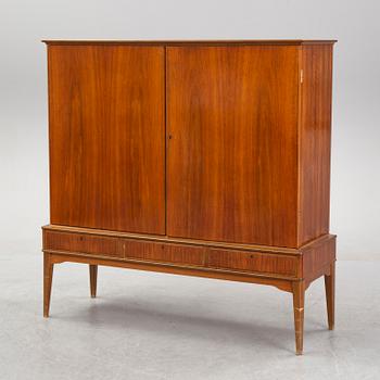 A walnut veneered cabinet, 1940's/50's.