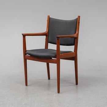 A teak armchair by Hans J Wegener for Johannes Hansen.