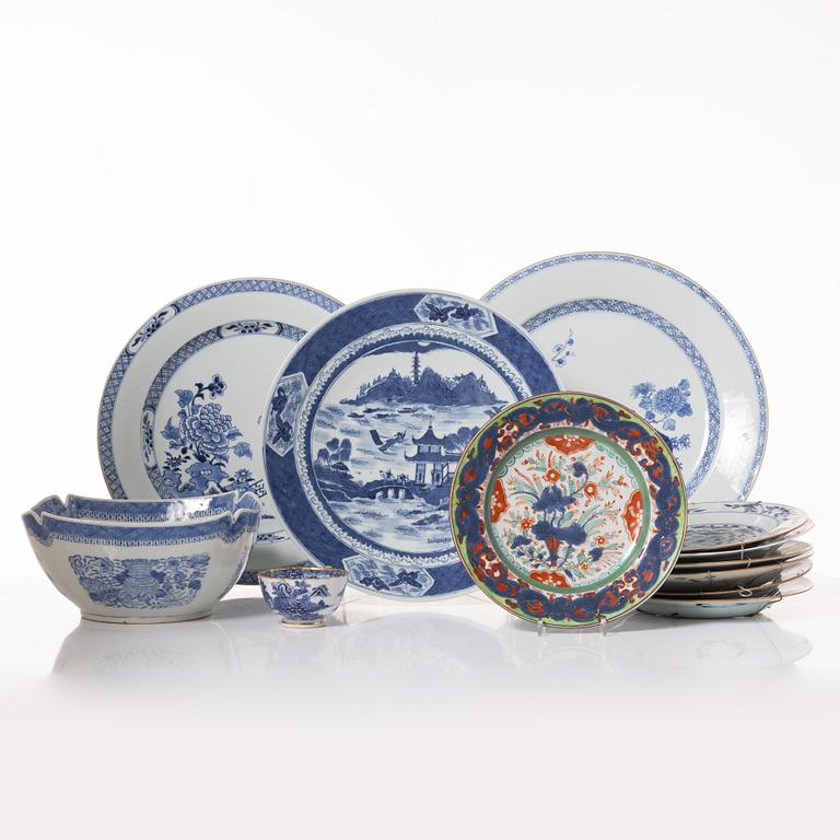 A group  of three serving dishes, a serving bowl, a cup, and seven plates, porcelain, including China 18th century.