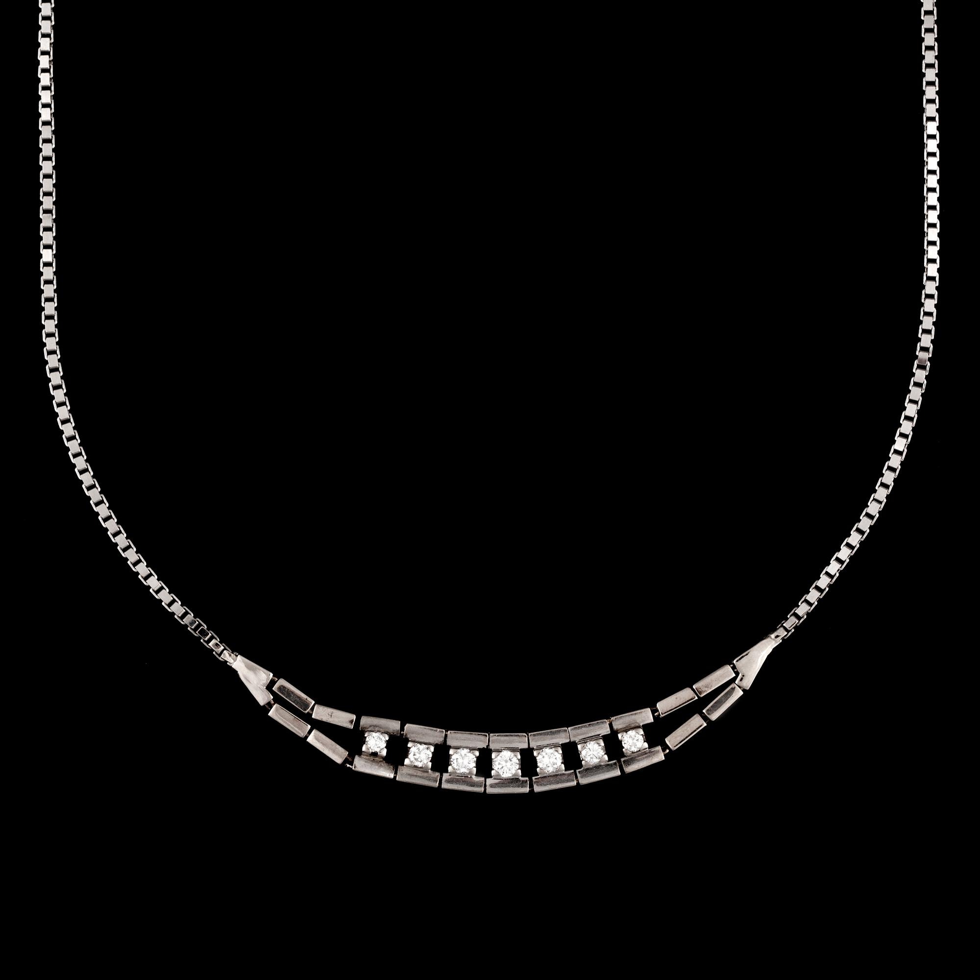 A diamond, circa 0.40 ct in total, necklace.
