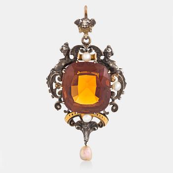 1099. A citrine pendant/brooch in silver and low fineness gold set with pearls.