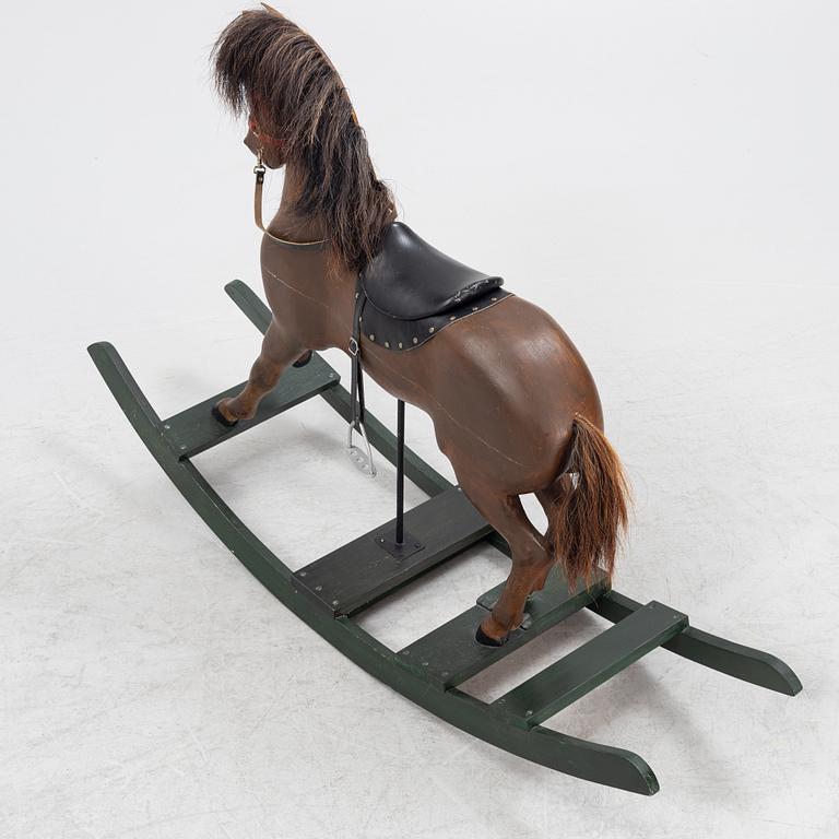 An early 20th century rocking horse.