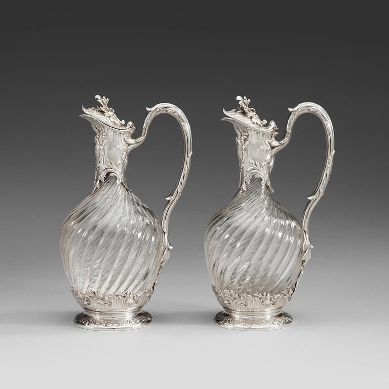A pair of French late 19th century silver and glass wine-flagons.