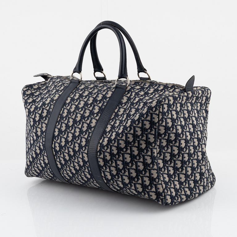 Christian Dior, a canvas weekend bag.