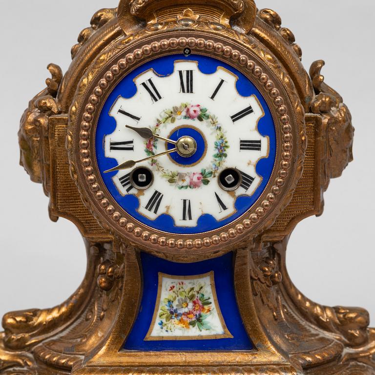 A Louis XVI-style mantel clock, circa 1900.