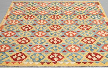 A carpet, kilim, ca 244 x 188 cm.