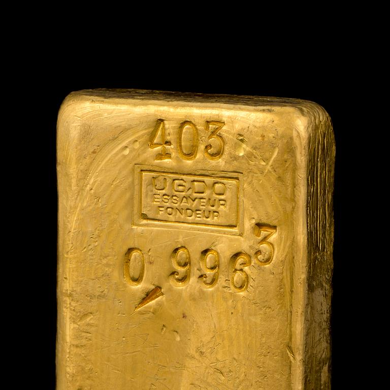 A 23K gold ingot, 1003 g, Ugdo essayeur fondeur.