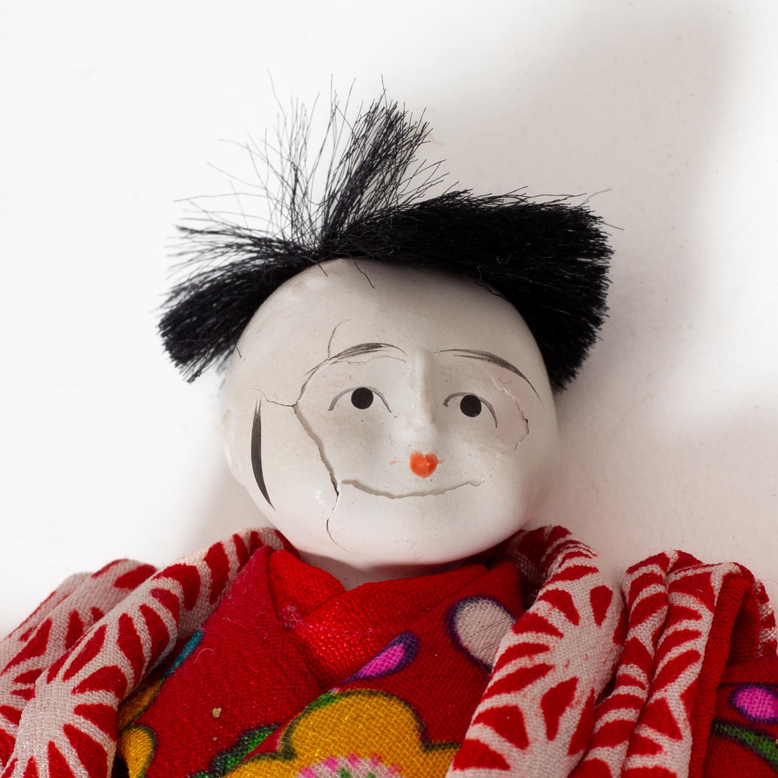 A group of eight Asian curio items, 19th and 20th century.