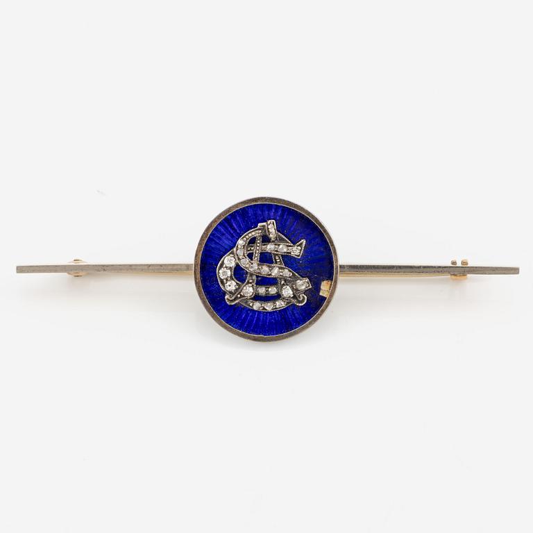 Brooch, gold/silver with blue enamel and monogram set with rose-cut diamonds.