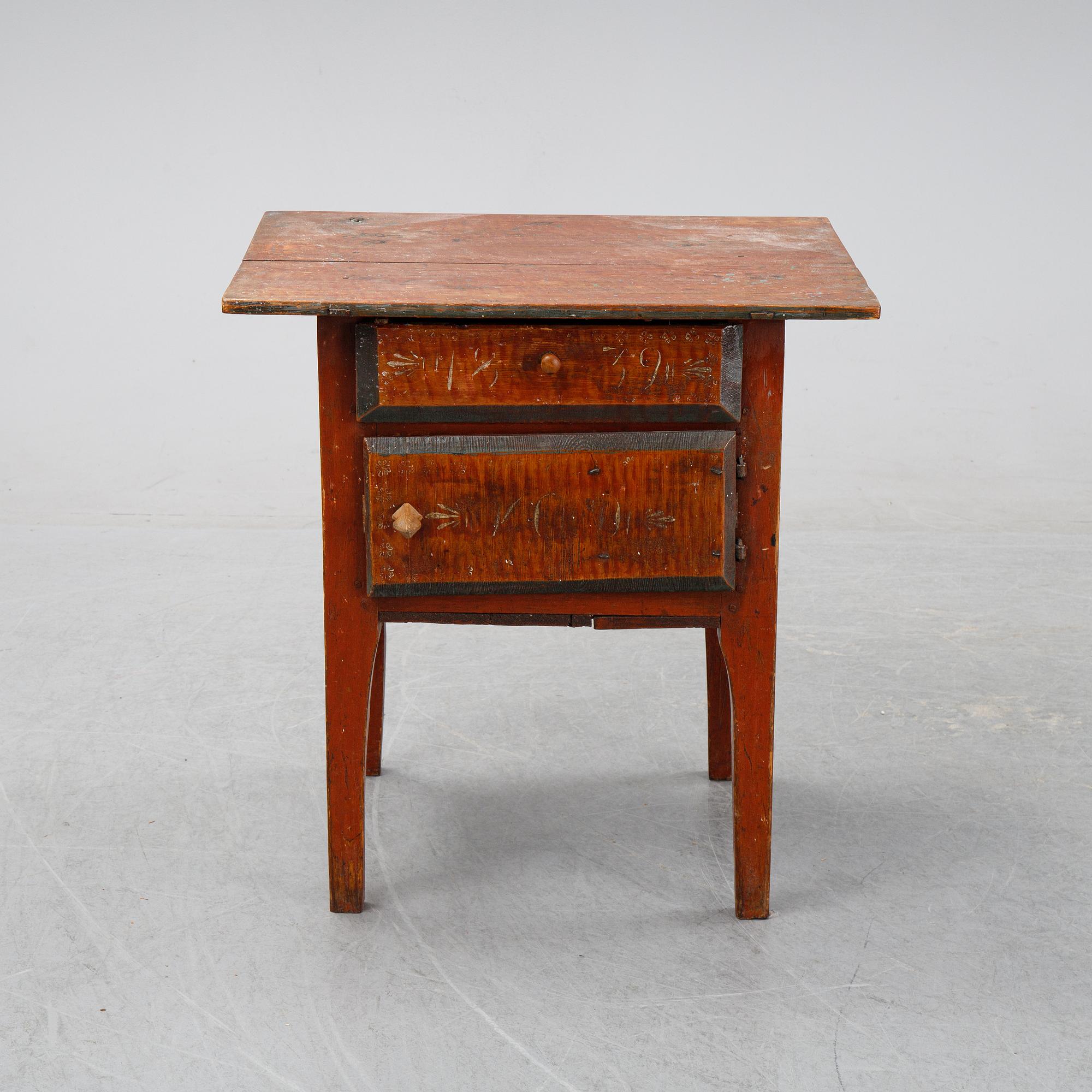 A swedish wooden table from Hälsingland, first half of the 19th century.