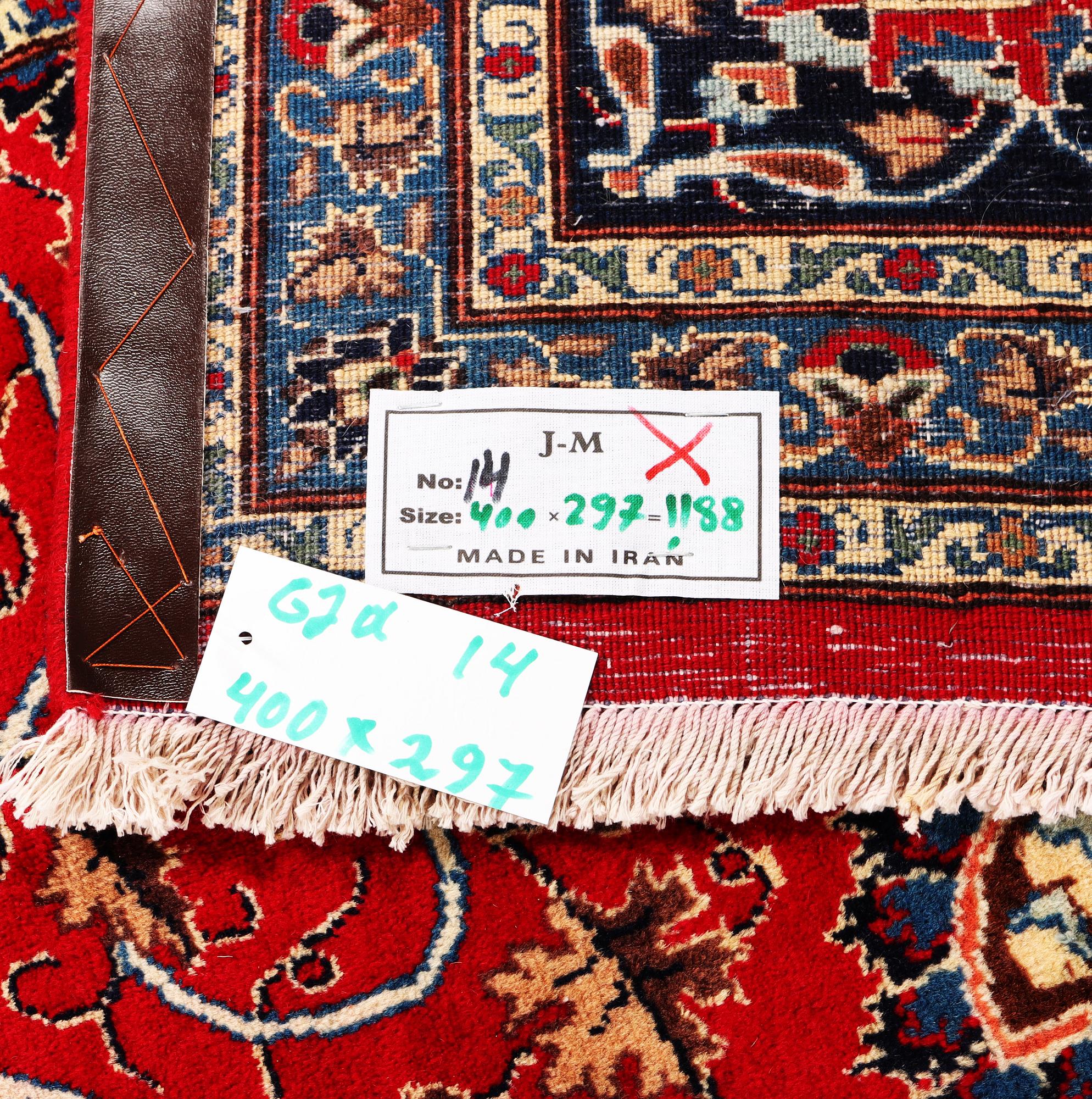 A Kashan carpet, c. 400 x 297 cm.