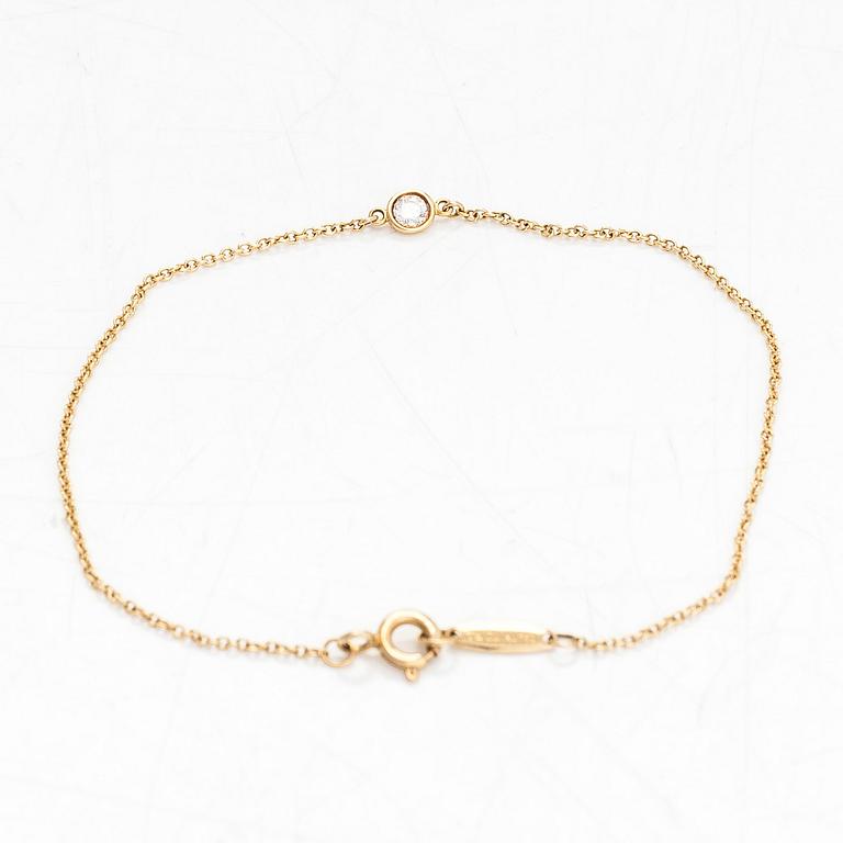 Tiffany & Co, Elsa Peretti, armband, "Diamonds by the Yard", 18K guld med en diamant ca 0.08 ct.