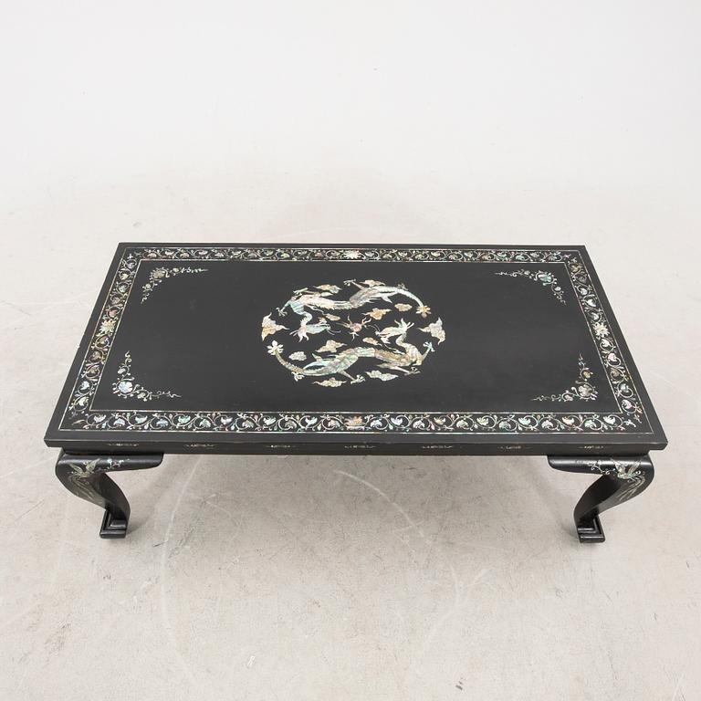 A Chinese lacquered coffee table later part of the 20th century.
