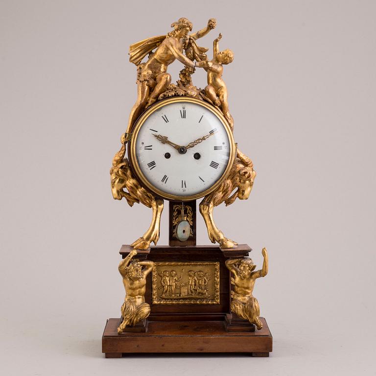 A PENDULUM CLOCK, first half of the 19th century.