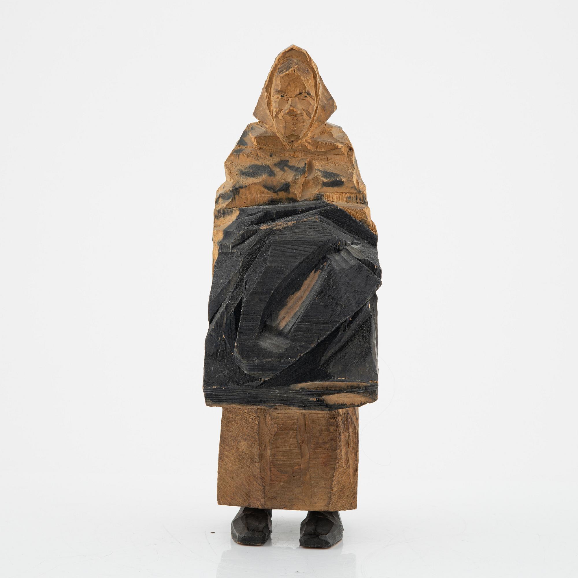 Axel Petersson Döderhultarn, skulptur, signerad. Delvis bemålat trä, höjd 25 cm.