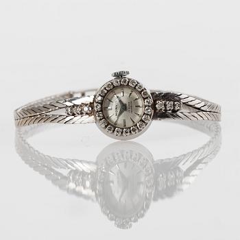 DAMARMBANDSUR, Monvis, 18K guld, 25 åttkantslipade diamanter, 1900-talets andra hälft. Vikt 20 g.