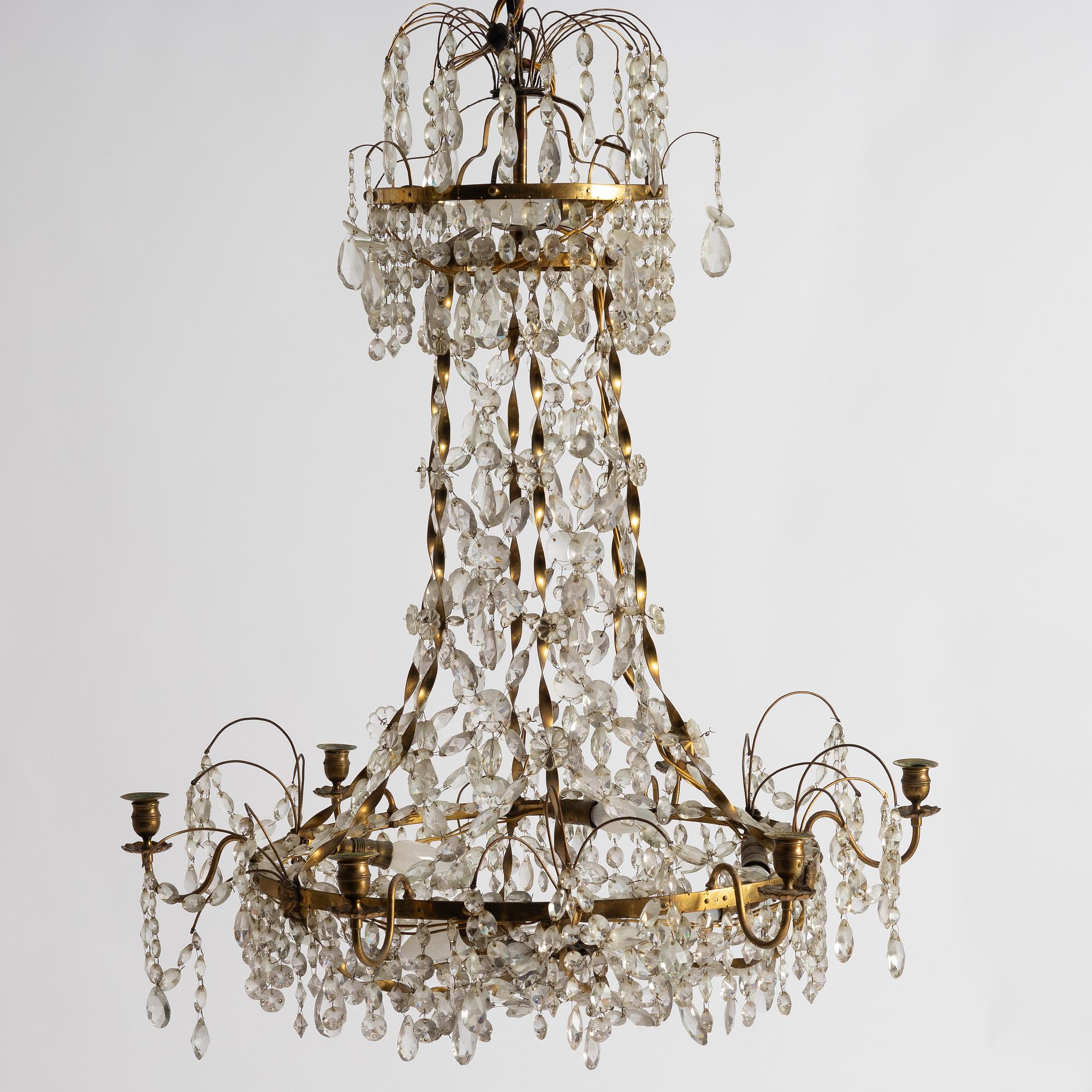 A late Gustavian gilt brass and cut glass seven-light chandelier, Stockholm, late 18th century.