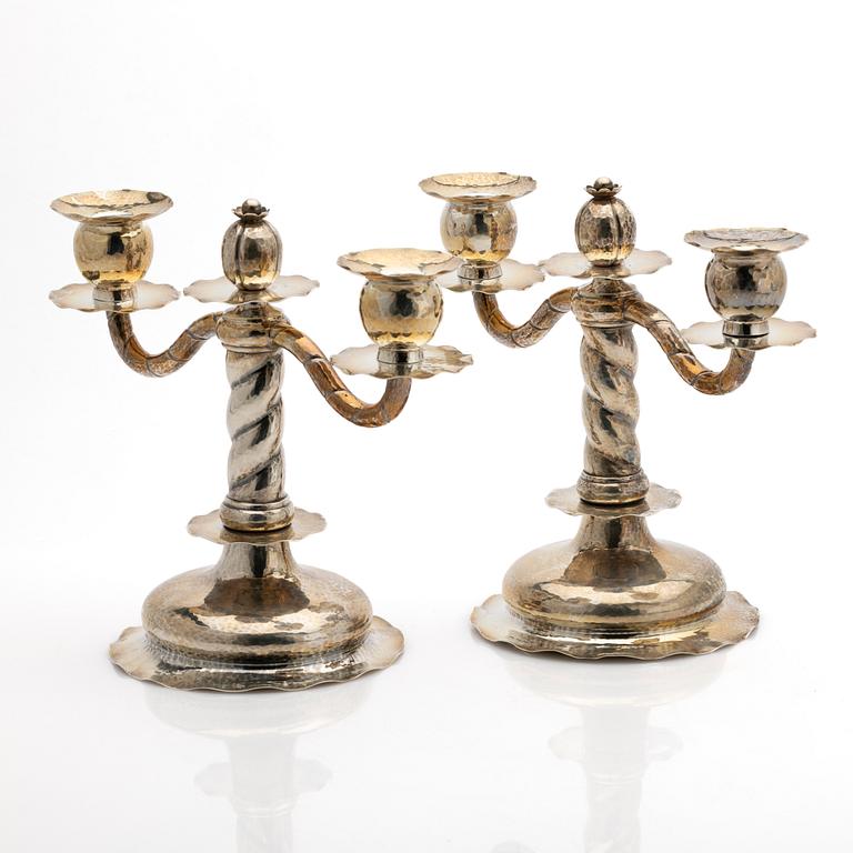 C.G. Hallberg, Pair of candelabra, silver, Stockholm, 1927.