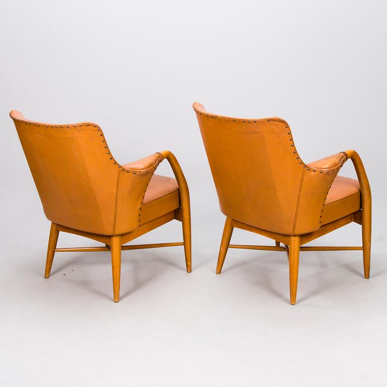 CARIN BRYGGMAN, A pair of 1950s armchairs for Kirjopuu, Finland.